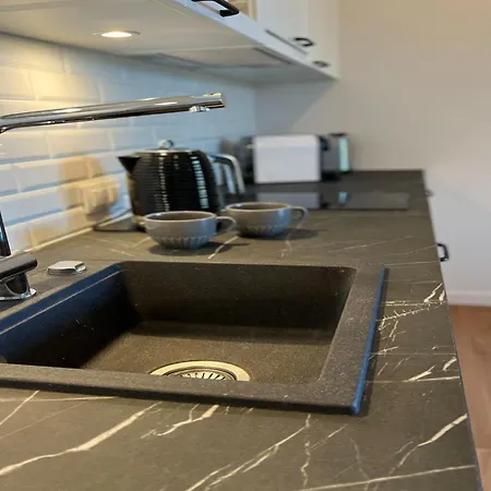 In By The * Pobierowo