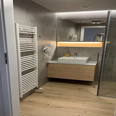 Apartament In By The