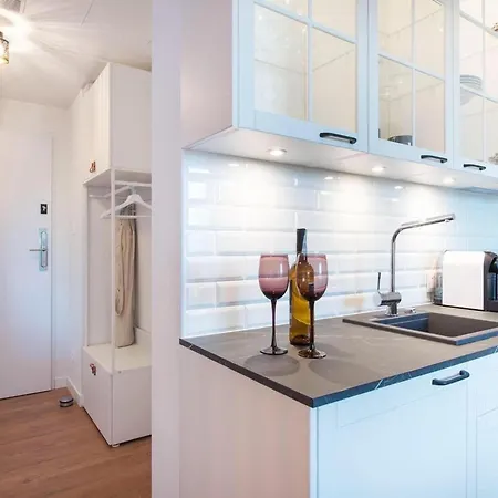 Apartament In By The