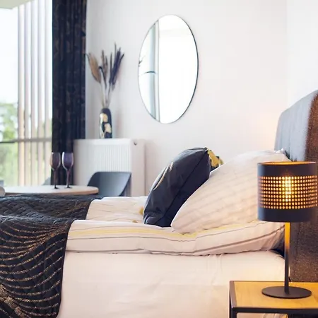 In By The * Pobierowo